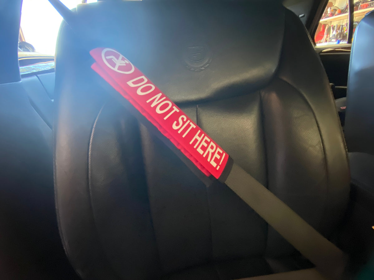 Red & Orange Seat Belt Covers ( Do Not Sit Here!) Pullover Pal